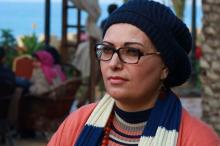  Amal Zaqout, A Worker as a Community Programme Officer in Gaza. 