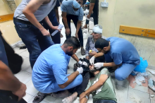  Doctors treating patients inside the overcrowded Indonesian Hospital, 8 November 2023. (Supplied to MAP by the Indonesian Hospital).