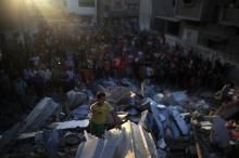  A Palestinian child amid the destruction caused by Israel’s military assault on Gaza. (Credit: Mohammed Zaanoun)
